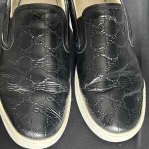 Gucci Black Embossed GG Leather Slip-On Loafers